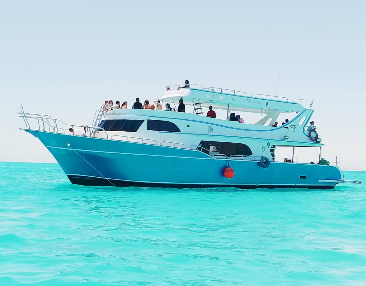Happy tourists on a boat
